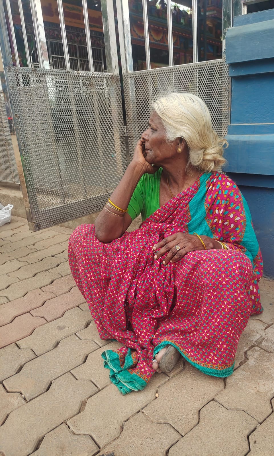 Buchamma sitting alone at the entrance of Poleramma Temple in Tanguturu before her rescue